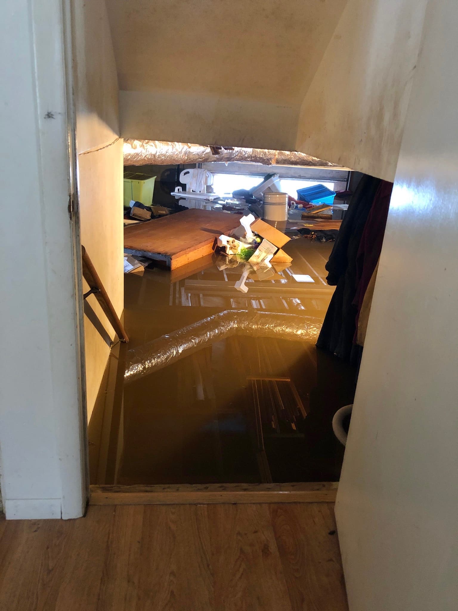 Stock photograph of a residential basement filled with floodwater